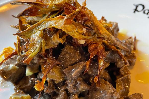 Coratella d'abbacchio con i carciofi